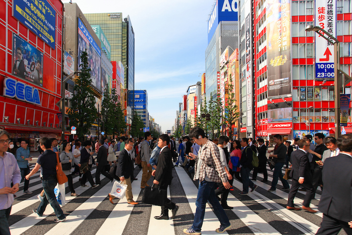 People crossing the street at Tokyo's Akihabara area